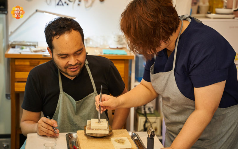 Instructor Teaching Hangeul Jewelry