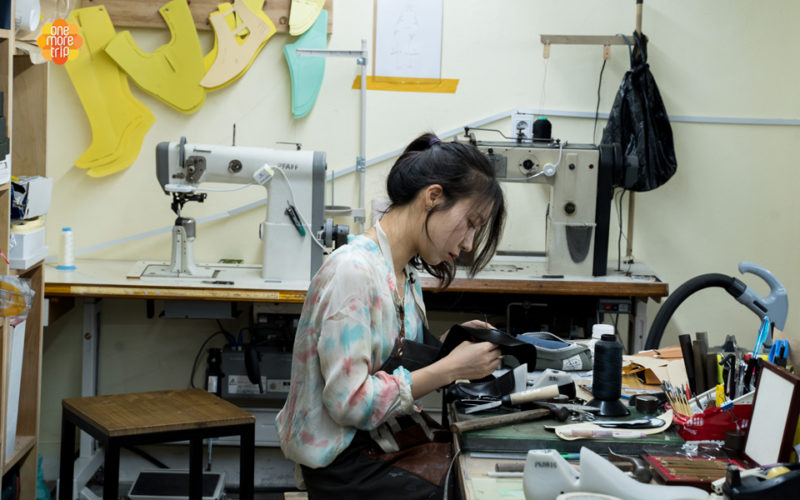 asian girl making shoes