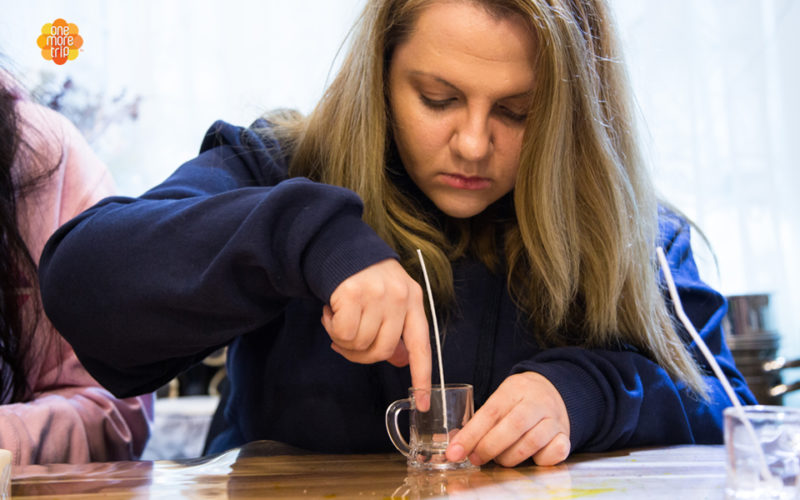 girl making beer candle