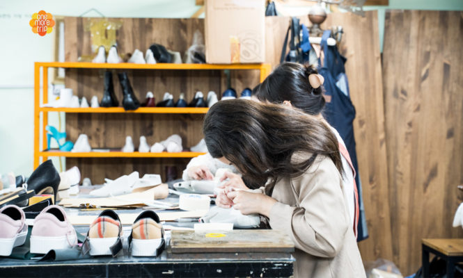 girl sewing shoes