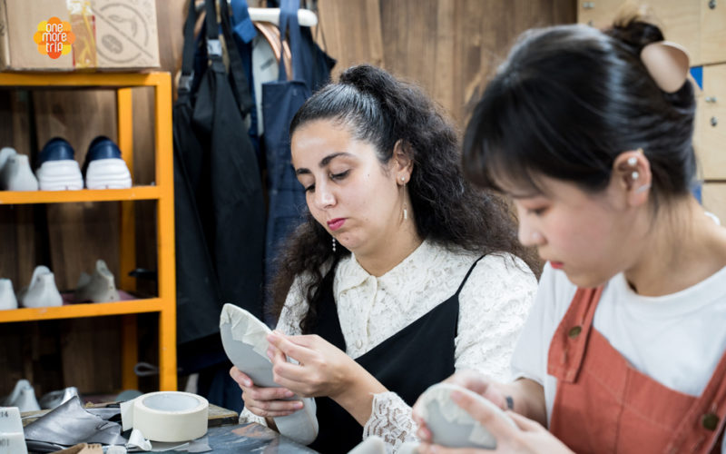 girls making shoes